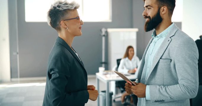 Picture of young architects discussing about project