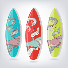 Set of surfboards with fish