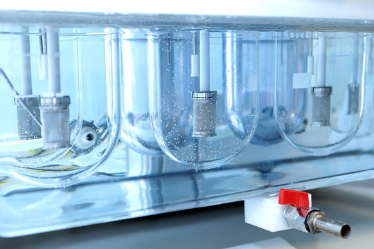 Autonomous solubility tester. Imitation dissolution of the tablet in the human stomach. Scientific research of pharmaceutical laboratory. Laboratory research in pharmacy.