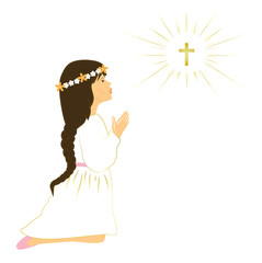 Long brown hair girl praying on her first holy communion day.