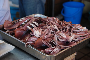 An octupuses with tentacles for food in outdoor stall in Japan