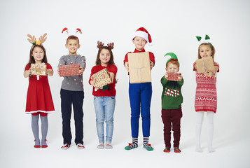 Shot of children showing their christmas present