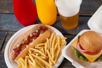 Drink and snacks on wooden table