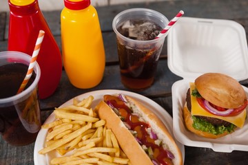 Drink and snacks on wooden table