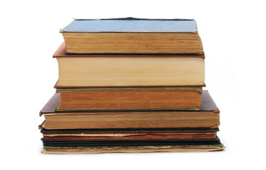 Stack of old antique big books isolated on white background