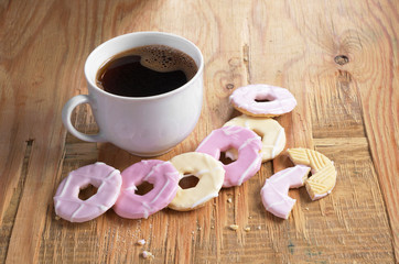 Coffee and cookies with icing