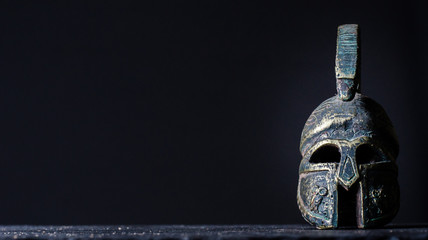 roman helmet on a black background