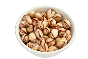 pistachios/ pistachios on a white background in a bowl