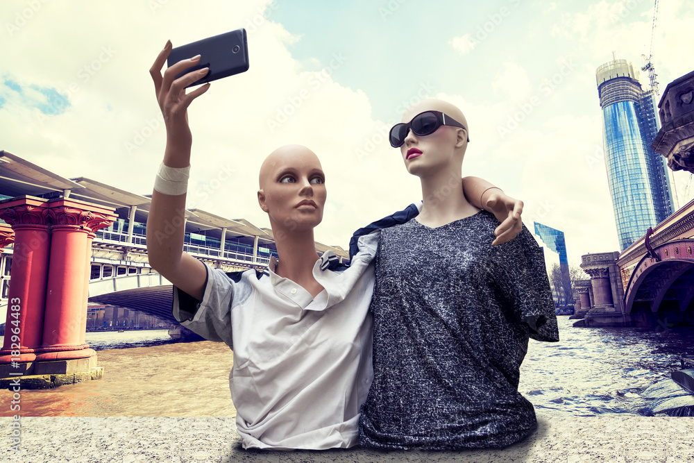 Wall mural pair of dummies tourists take a selfie