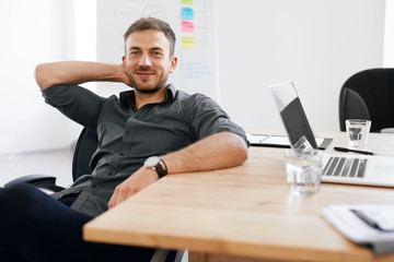 Business Man Portrait. Smiling Man In Office