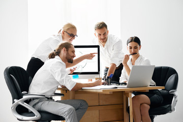 Business Meeting. People Working On Project In Office