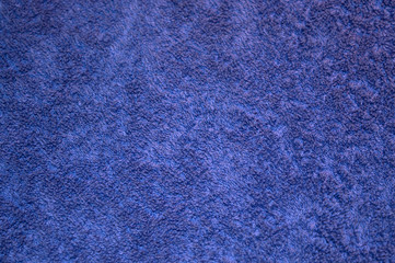 Purple cotton towel texture, fibers of bath towel background