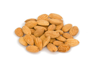 Pile of Roasted almonds isolated on white background