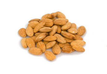 Pile of Roasted almonds isolated on white background