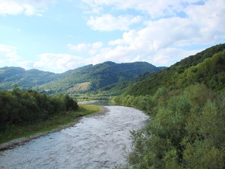 Fototapeta na wymiar Stryi River in the mountain range 