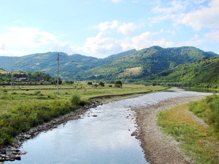 Fototapeta na wymiar Stryi River in the mountain range 