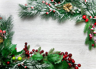 Fototapeta na wymiar Christmas and New Year's composition. The pine cones, spruce branches on a wooden white background