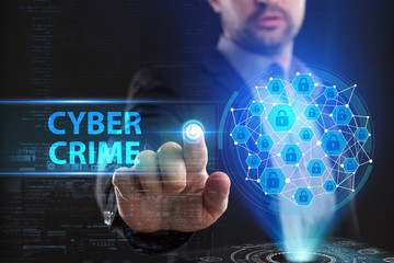 The concept of business, technology, the Internet and the network. A young entrepreneur working on a virtual screen of the future and sees the inscription: Cyber crime