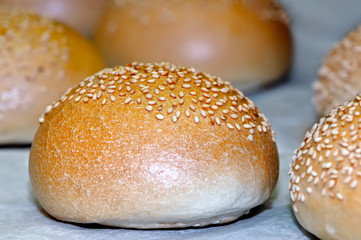 White bread loaves sprinkled with sesame seeds