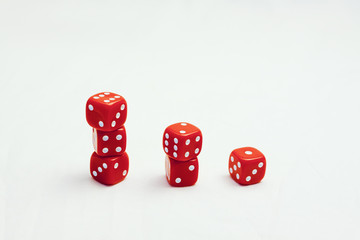 concept luck - red dice on each other on white background
