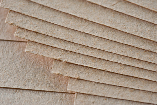 The texture of coarse paper, a bundle of cardboard