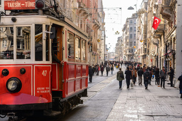 Of the places most visited by tourists, Istiklal Street, the clock is getting very crowded. - obrazy, fototapety, plakaty