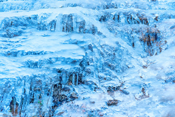 Ice texture on a rock. Abstract winter background