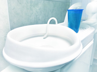 Spitting reservoir or salivary sink in dental clinic
