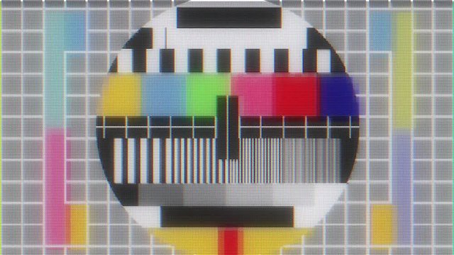 TV test tablet with glitch interference on lcd screen background animation - new quality digital twitch technology colorful video footage