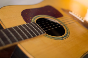 Obraz premium detail of classic guitar and strings with shallow depth of field