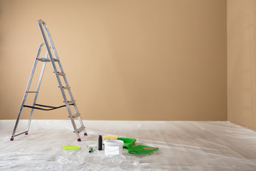 Painted Room With Ladder And Painting Equipments