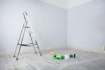 Painted White Room With Ladder And Painting Equipments