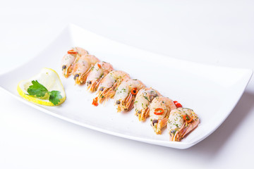 Shrimps fried with garlic and chili. Close-up, selective focus.