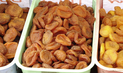 Heap of dried apricots close-up.