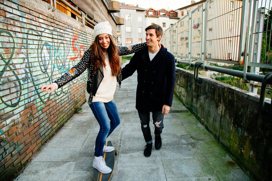 Funny Couple Learning To Skate