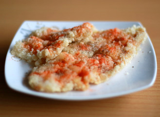 Shihlin crispy chicken with wood background. One of the original hawker which is very famous in...