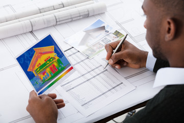 Architect Calculating Heat Temperature