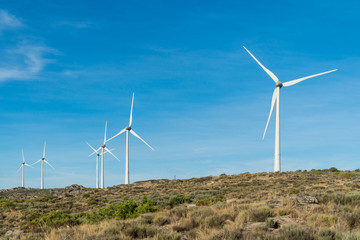 Wind turbines in a rocky mountains in Portugal