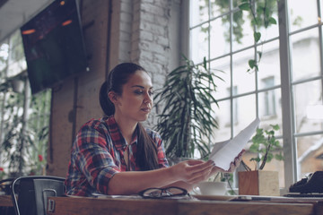 Young woman in cafe