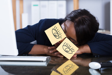 Woman Sleeping With Eyes Drawn On Adhesive Notes