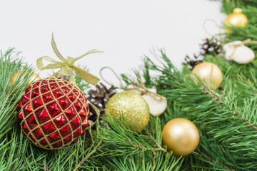 Fototapeta na wymiar Glass ball and decorations on Christmas garland