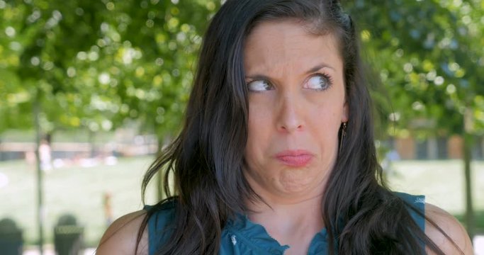 Unhappy woman in her 30s expressing discomfort and abdominal pain