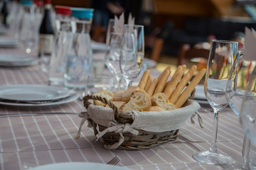 close up of bread basket with breadsticks