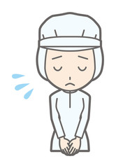 Obraz premium A female worker wearing white sanitary clothes bowed with a troubled expression