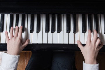 Boy playing the piano