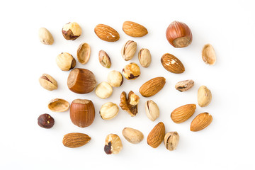 Assorted mixed nuts pattern isolated on white background. Top view

