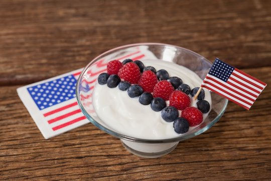 Close-up of fruit ice cream decorated with 4th july theme