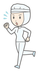 A female worker wearing white sanitary clothing is running