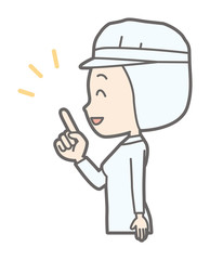 A female worker wearing white sanitary clothes points to the side and points it.