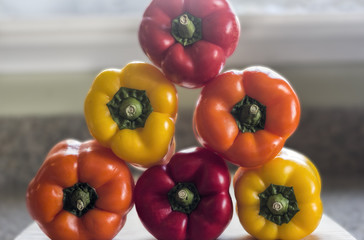 Stack of Red, Yellow & Orange Peppers
